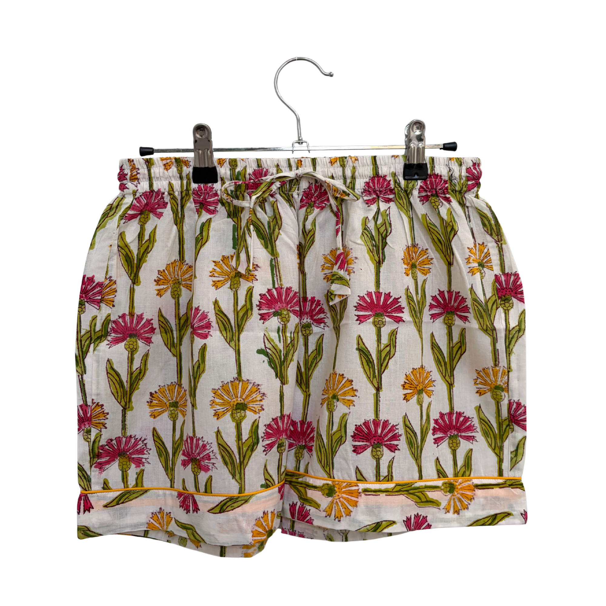 Pajama Crush gift-ready pouch in Sweet Bloom block print cotton, filled with pajama set