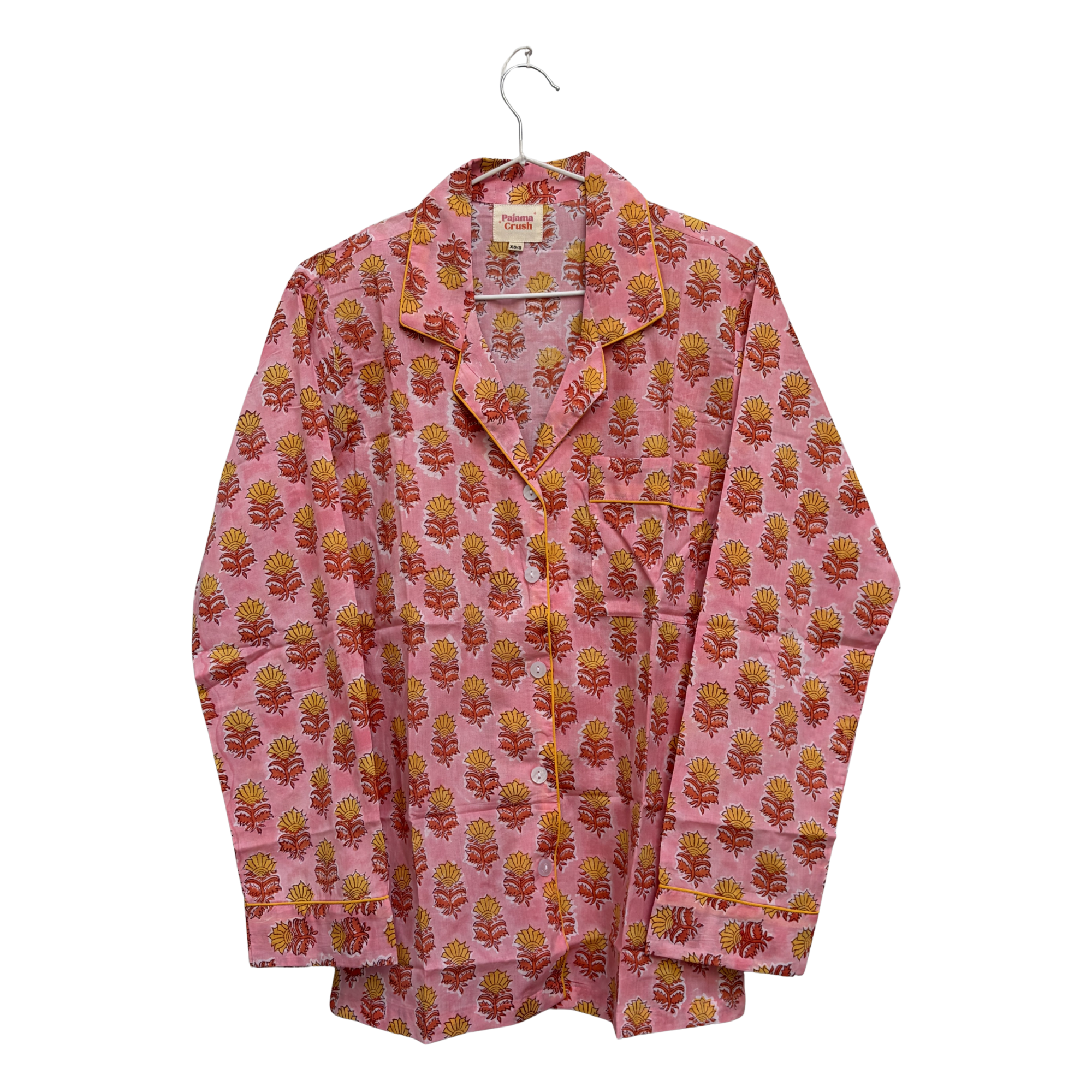 Pajama Crush gift-ready pouch in Quiet Blossom block print cotton, filled with pajama set